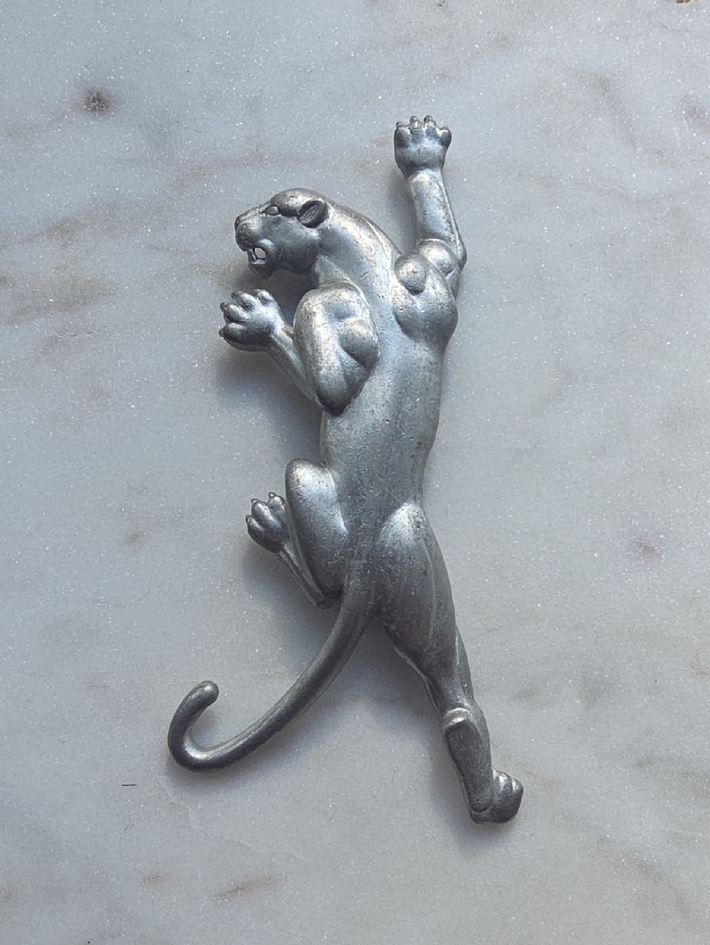 Jonette Jewelry (JJ) vintage silver-toned climbing panther brooch